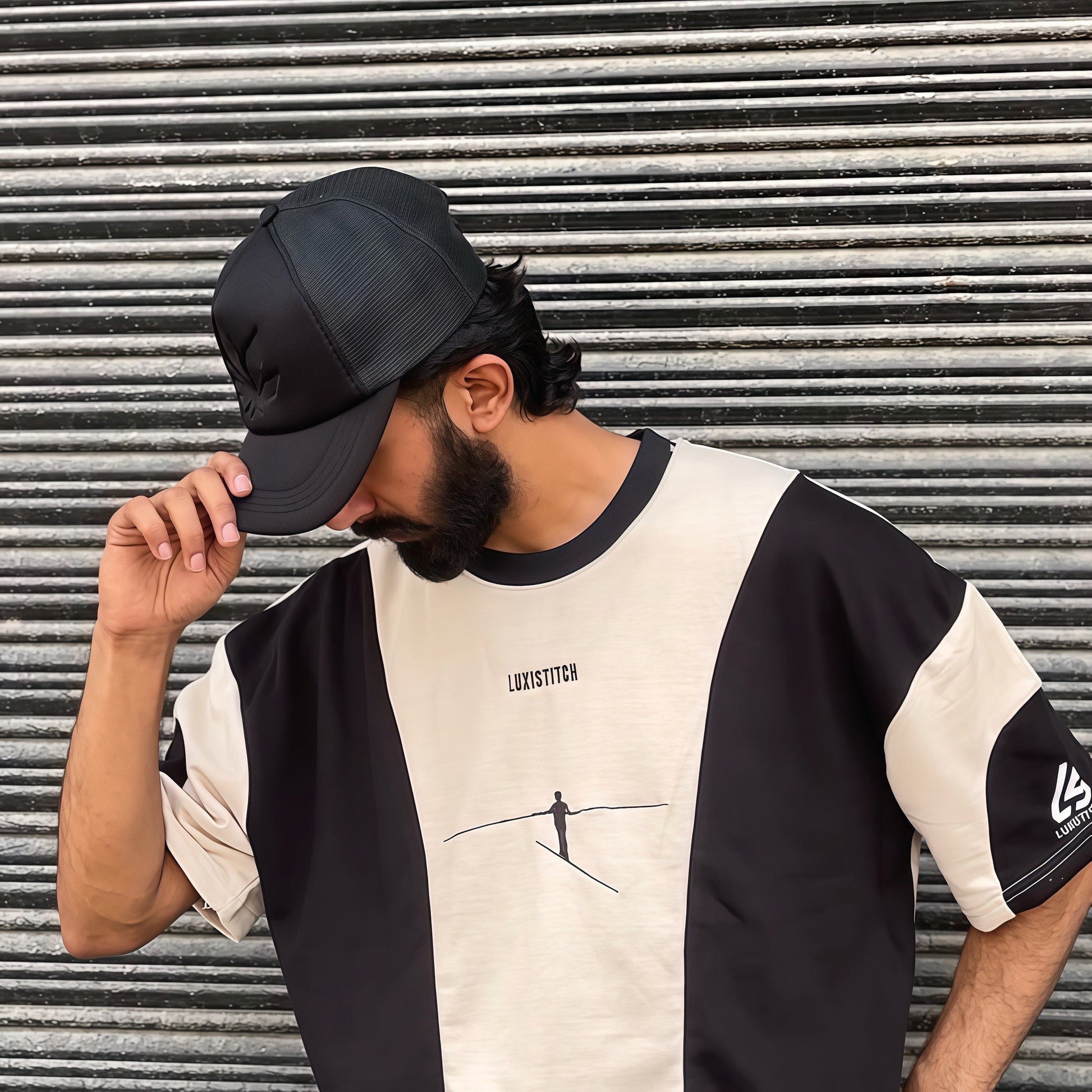 Man wearing a black premium maple leaf trucker hat by LUXUSIO with a black and beige shirt